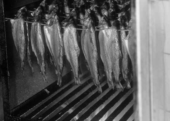Fish hanging in the traditional smoke ovens at Griestal